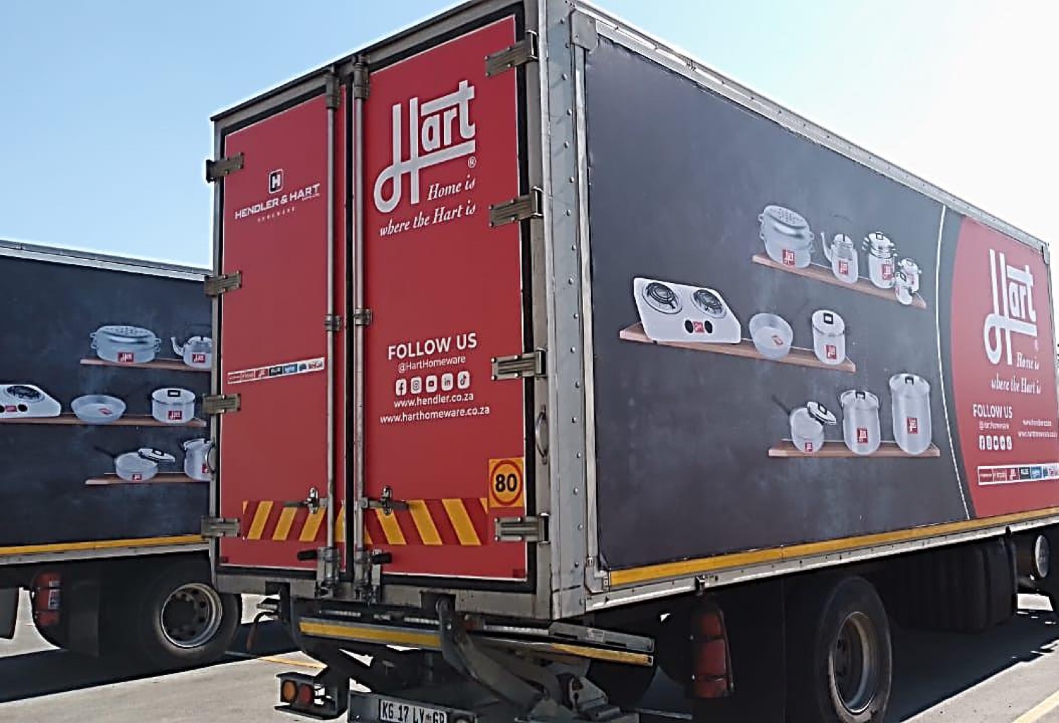 Hart Homeware branded rigid truck, rear three-quarter